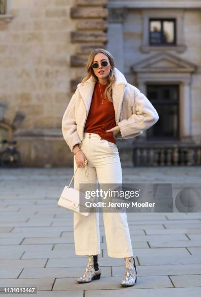 Kira Tolk wearing jacket, sweater and trousers from &otherstories, Chanel bag and Vagabond shoes on February 18, 2019 in Hamburg, Germany.