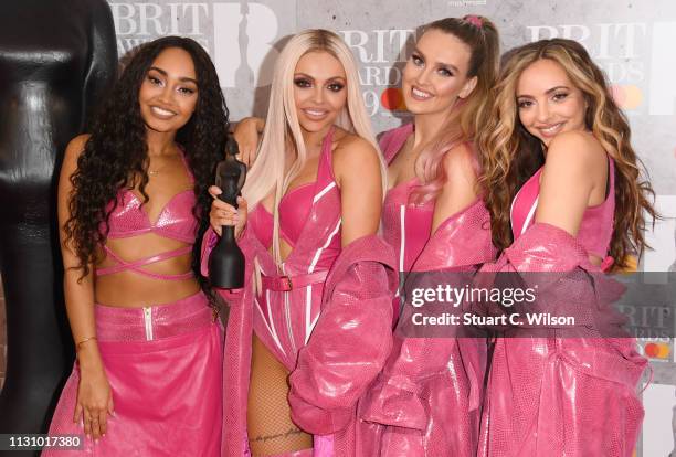 Perrie Edwards, Jesy Nelson, Jade Thirlwall and Leigh-Anne Pinnock of 'Little Mix' in the winners room during The BRIT Awards 2019 held at The O2...