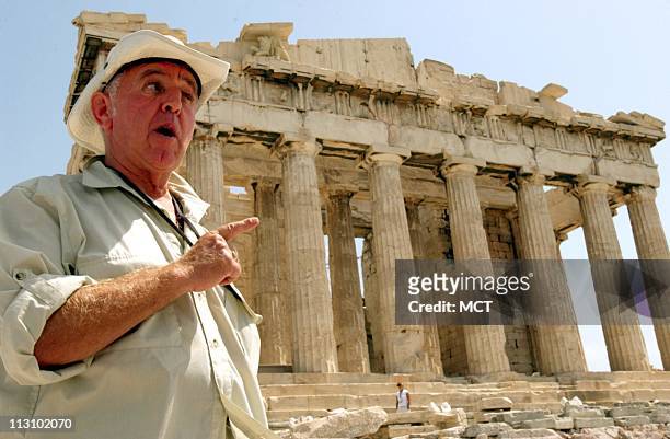 Robert W. Blackiie, a tourist from Cornwall, England, stands in front of the Parthenon Athens, Greece, on Friday, August 27 and talks about the...