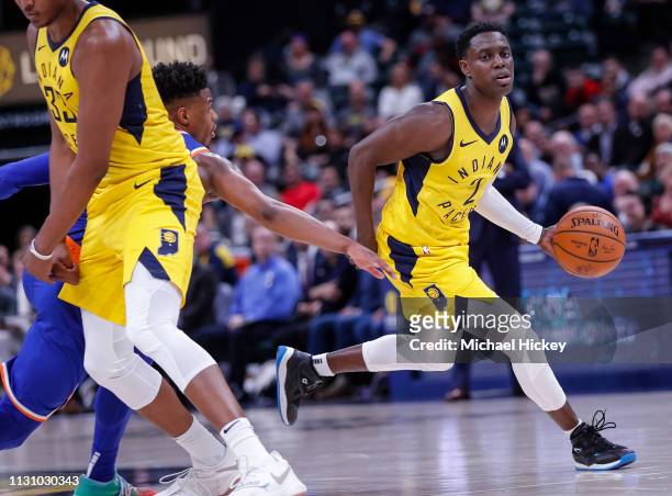 Darren Collison of the Indiana Pacers dribbles the ball during the game against the New York Knicks at Bankers Life Fieldhouse on March 12, 2019 in...