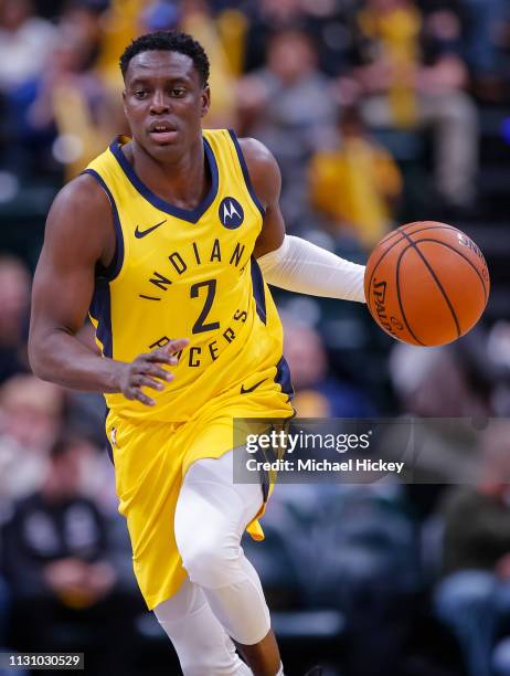 Darren Collison of the Indiana Pacers brings the ball up court during the game against the New York Knicks at Bankers Life Fieldhouse on March 12,...