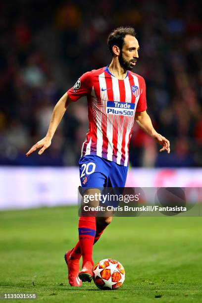 Juanfran of Club Atletico de Madrid in action during the UEFA Champions League Round of 16 First Leg match between Club Atletico de Madrid and...