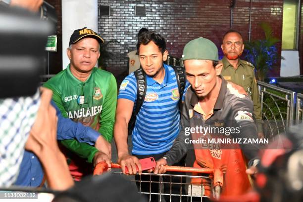 Bangladesh cricketer Mushfiqur Rahim is seen upon the team's arrival from New Zealand in Dhaka on March 16 a day after narrowly escaping the mosque...