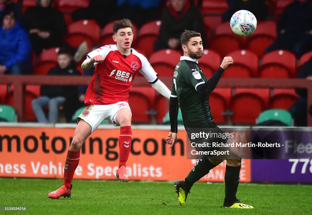 Joseph Rydel Fleetwood Town's Ryan Rydel competes with Plymouth Argyle's Joe Riley ...