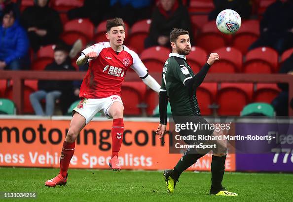 Ryan Rydel Fleetwood Town's Ryan Rydel competes with Plymouth Argyle's Joe Riley ...