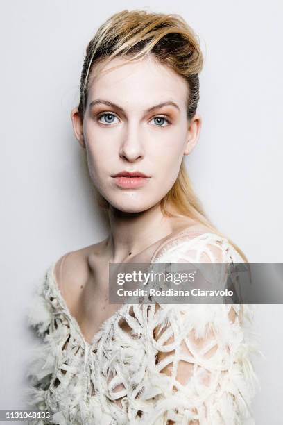 Model is seen backstage ahead of the Alberto Zambelli show at Milan Fashion Week Autumn/Winter 2019/20 on February 20, 2019 in Milan, Italy.