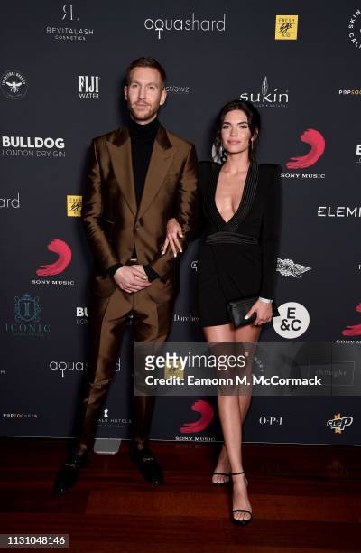 Calvin Harris and Aarika Wolf attend the Sony Music BRIT awards after party at aqua shard on February 20, 2019 in London, England.