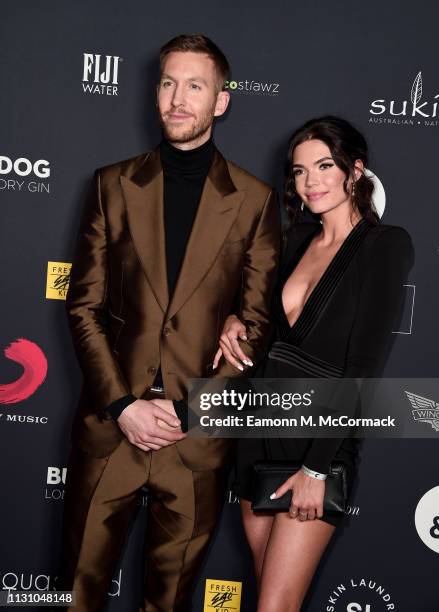 Calvin Harris and Aarika Wolf attend the Sony Music BRIT awards after party at aqua shard on February 20, 2019 in London, England.