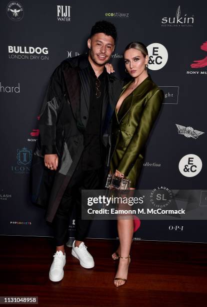 Alex Oxlade-Chamberlain and Perrie Edwards attend the Sony Music BRIT awards after party at aqua shard on February 20, 2019 in London, England.