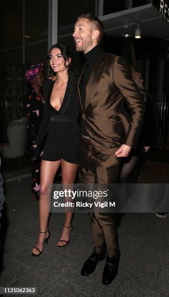 Aarika Wolf and Calvin Harris seen attending the Sony Music BRITS 2019 After Party at The Shard on February 20, 2019 in London, England.