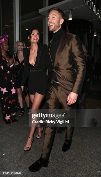 Aarika Wolf and Calvin Harris seen attending the Sony Music BRITS 2019 After Party at The Shard on February 20, 2019 in London, England.