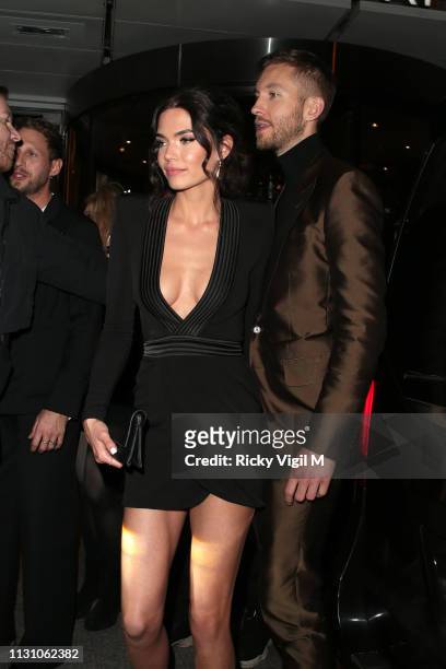 Aarika Wolf and Calvin Harris seen attending the Sony Music BRITS 2019 After Party at The Shard on February 20, 2019 in London, England.