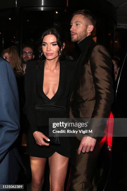 Aarika Wolf and Calvin Harris seen attending the Sony Music BRITS 2019 After Party at The Shard on February 20, 2019 in London, England.