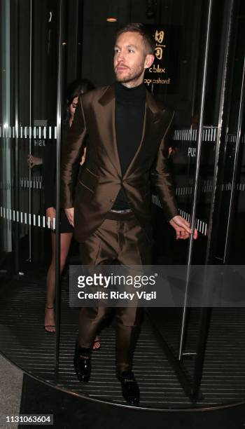 Aarika Wolf and Calvin Harris seen attending the Sony Music BRITS 2019 After Party at The Shard on February 20, 2019 in London, England.