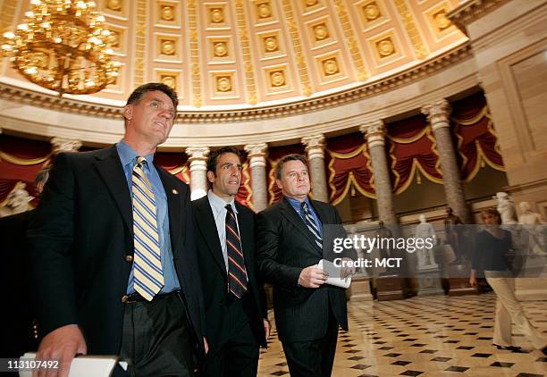 Congressman Dave Weldon R-Fla., left, Bobby Schindler, brother of Terri Schiavo, center, and Chris Smith, R-N.J., walk to the House of...