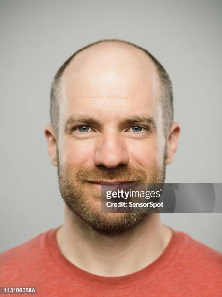 real caucasian man with happy expression looking at camera - bald head stock pictures, royalty-free photos & images