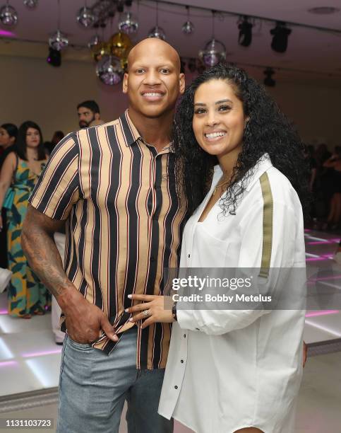 Ryan Shazier and Michelle Rodriguez attend the 6th Annual A Night On The Runwade at Aventura Mall on March 16, 2019 in Miami, Florida.