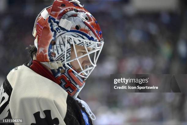 Hershey Bears goalie Ilya Samsonov looks through the bars of his Washington Capitals goalie mask during the Bridgeport Sound Tigers vs. The Hershey...