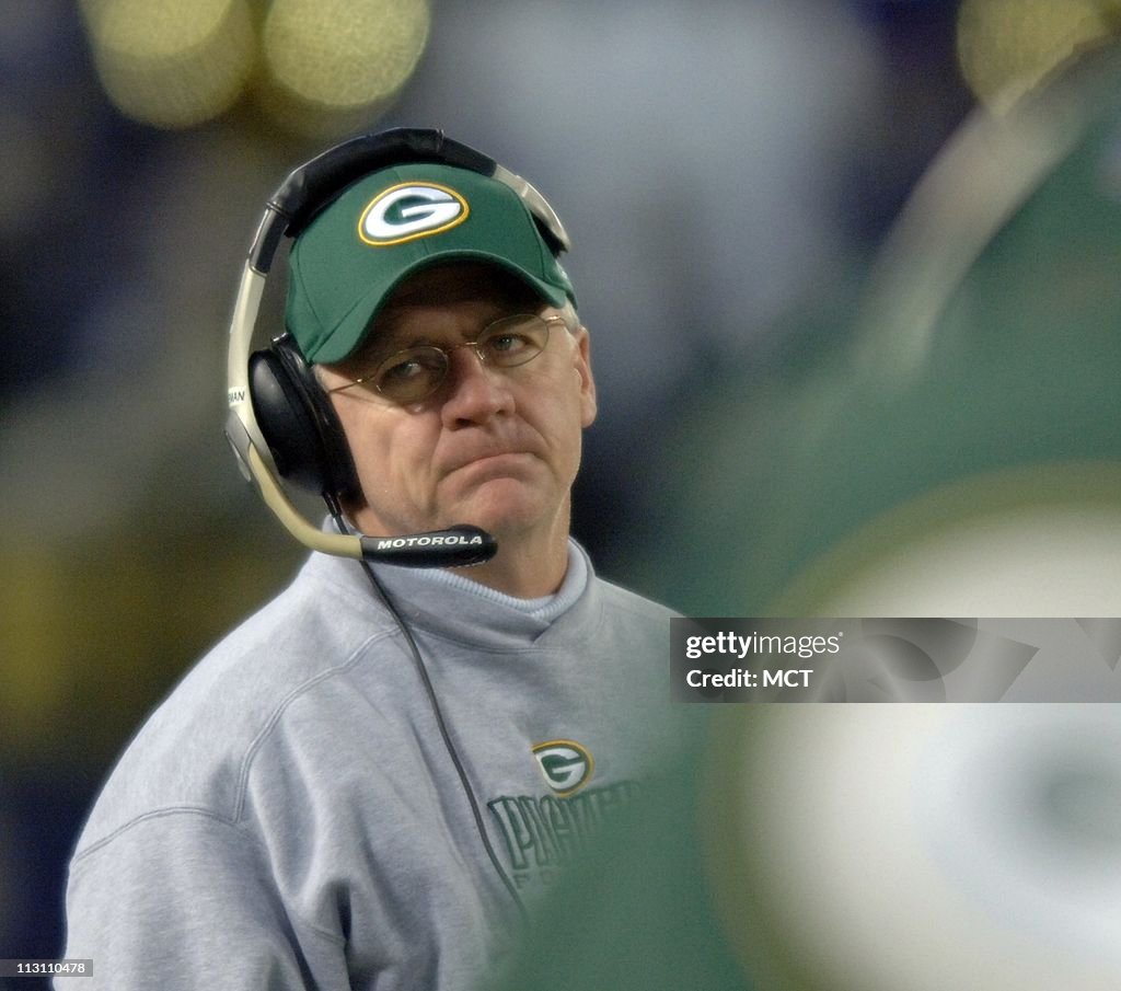 Green Bay Packers' head coach Mike Sherman looks on from the