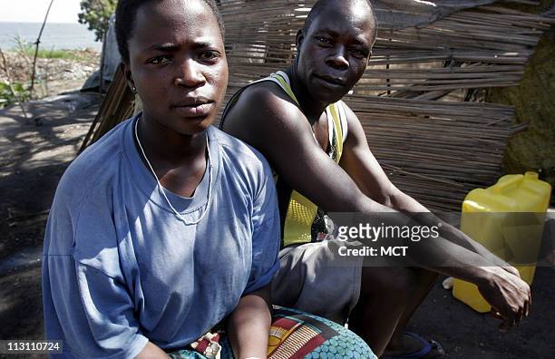 Vani Dikanza a victim of rape in war torn eastern Congo and her husband Gilbert Gusapa at their makeshift home in the Tchomia displaced persons camp,...