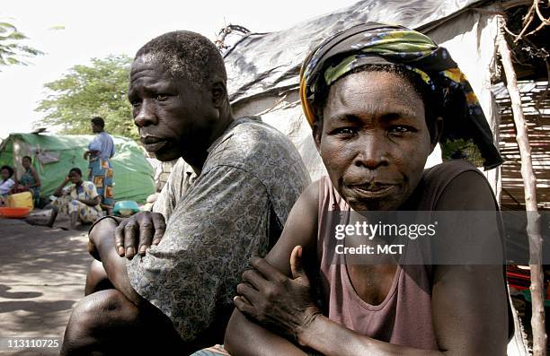 Madeleine Borive and her hubsand of 12 years, Louis Dheli in the Tchomia displaced persons camp, November 27, 2005. Across war-scarred northeast...