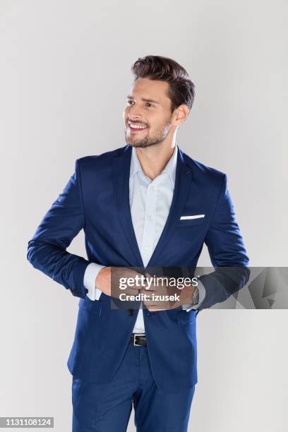 portrait of handsome young businessman - smart studio shot stock pictures, royalty-free photos & images