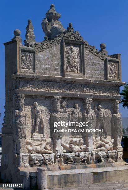 Greek Fountain depicting the metamorphosis of Dirce, Salmacis and Biblide transformed into water sources, Gallipoli, Apulia, Italy, Greco-Roman...