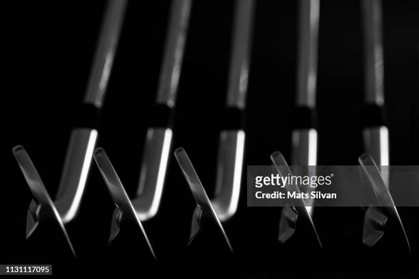 modern iron golf clubs blades - golf club stock pictures, royalty-free photos & images
