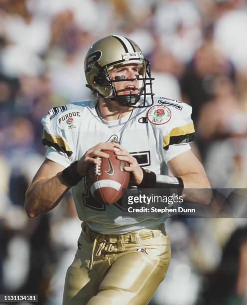 Drew Brees, Quarterback for the Purdue University Boilermakers calls the play at the snap against the University of Washington Huskies during the...