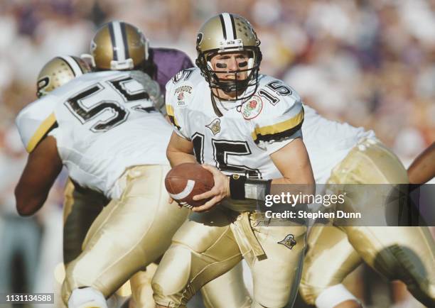 Drew Brees, Quarterback for the Purdue University Boilermakers calls the play at the snap against the University of Washington Huskies during the...