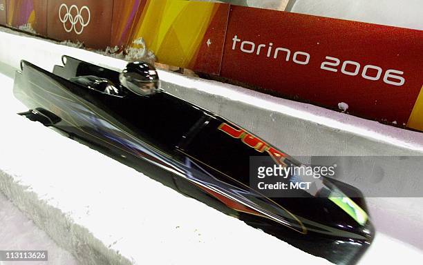 Pilot Todd Hayes and brake man Pavle Jovanovic begin their second run in the Men's 2-Man Bobsled competition at Cesana Pariol Saturday, February 18...