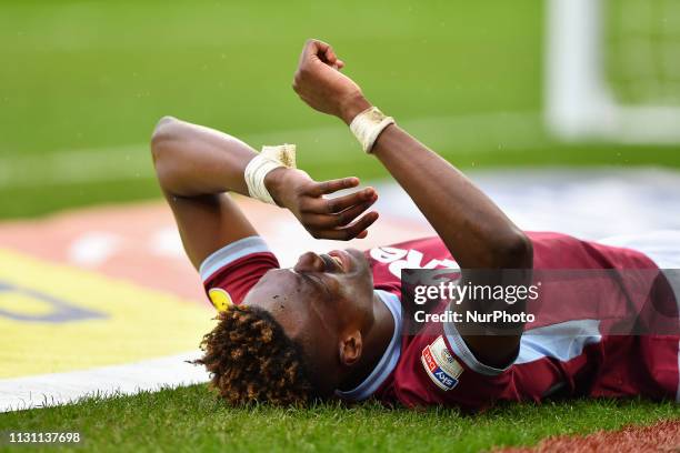 Tammy Abraham of Aston Villa in pain after suffering from an injury during the Sky Bet Championship match between Aston Villa and Middlesbrough at...