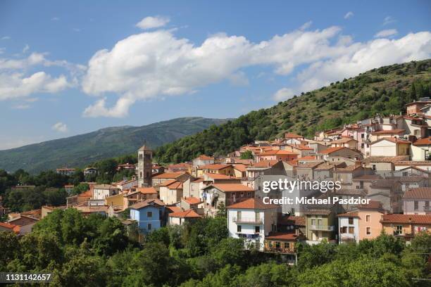 view on mountain village - sardinien stock-fotos und bilder