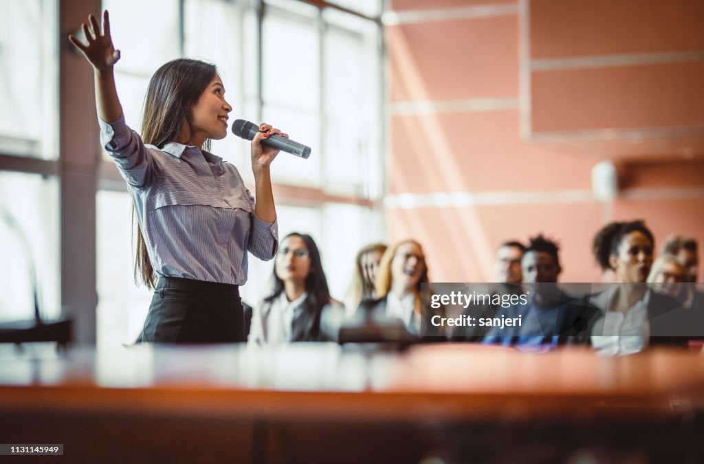 Business People Listening to the Public Speaker