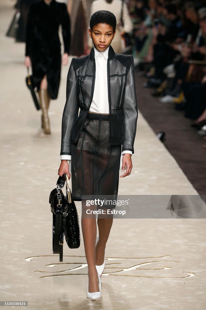 A model walks the runway at the Fendi show at Milan Fashion Week ...