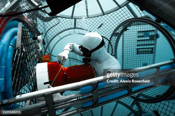 Diver and astronaut testing the Esprit module of the Lunar Orbital Platform-Gateway in the pools of Comex, on February 21, 2019 in Marseille, France.