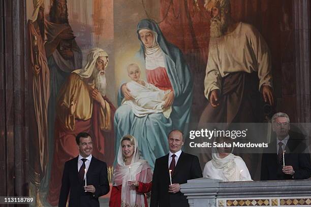 Russia's President Dmitry Medvedev, first lady Svetlana Medvedeva, Prime Minister Vladimir Putin and his wife Lyudmila Putina, Moscow's Mayor Sergey...