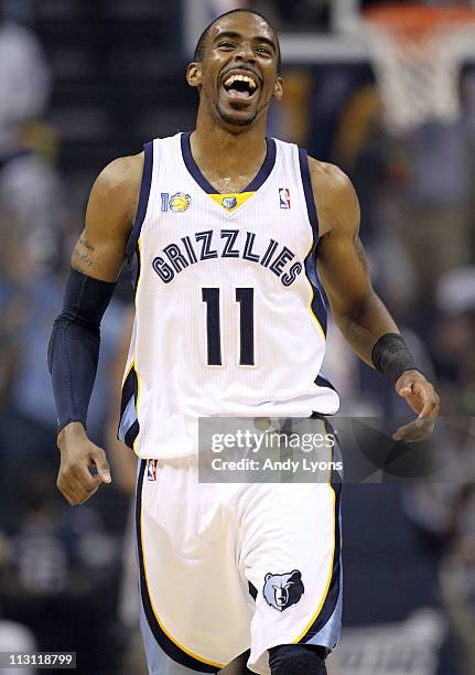 Mike Conley of the Memphis Grizzles celebrates during the game against the San Antonio Spurs in Game three of the Western Conference Quarterfinals in...