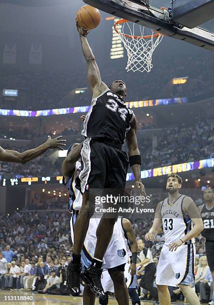 Antonio McDyess of the San Antonio Spurs shoots the ball during the game against the Memphis Grizzles in Game three of the Western Conference...