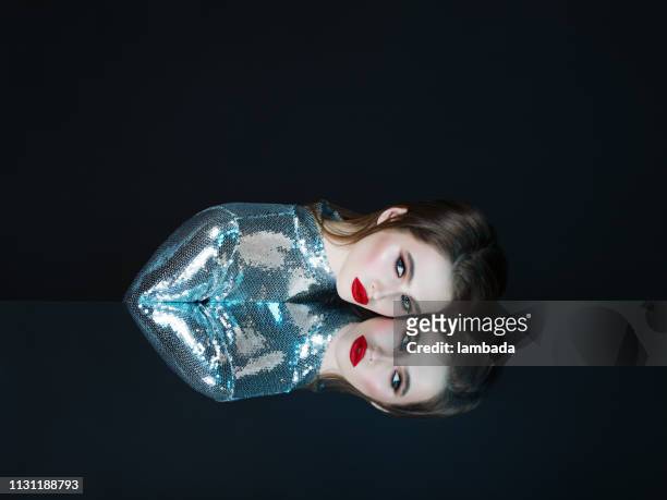 woman and her mirror reflection - magical thinking stock pictures, royalty-free photos & images