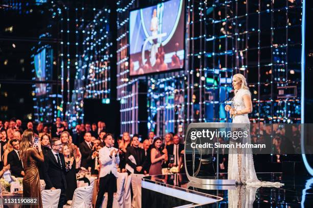 Lindsey Vonn, winner of the Laureus Spirit of Sport Award 2019 speaks on stage with her trophy during the 2019 Laureus World Sports Awards at the...