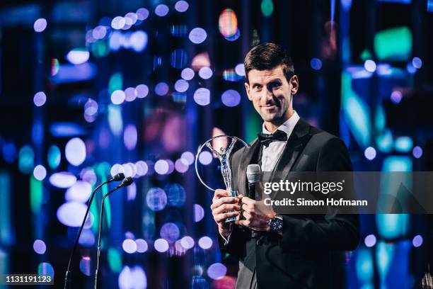 Laureus World Sportsman of The Year 2019 winner Novak Djokovic speaks on stage with his trophy during the 2019 Laureus World Sports Awards at the...