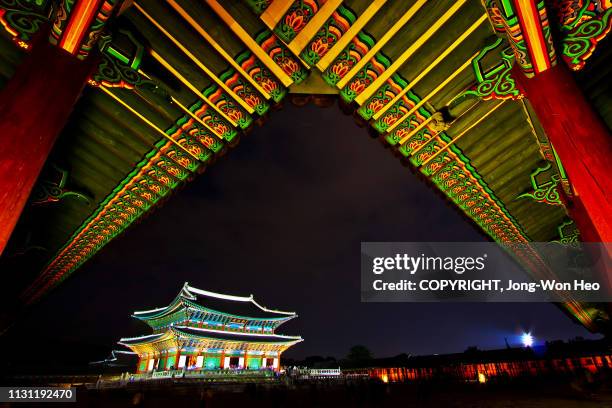 the night view of the old korean palace with the wide angle lens - korea tradition stock pictures, royalty-free photos & images