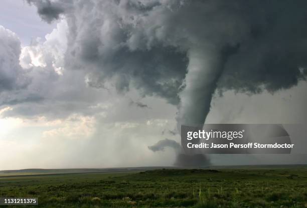 this tornado demonstrates "barber poling": the rotational bands twisting around the tornado itself, campo, colorado, usa - extreme weather stock pictures, royalty-free photos & images