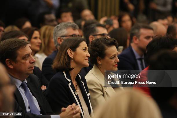 The minister of Agriculture, Luis Planas , the minister of Industry, Reyes Maroto , and the minister of Labor, Magdalena Valerio , are seen during...