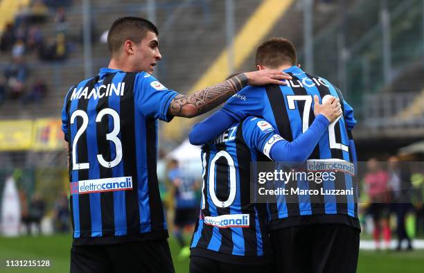 Josip Ilicic of Atalanta BC celebrates his goal with his team-mates Alejandro Dario Gomez and Gianluca Mancini during the Serie A match between...