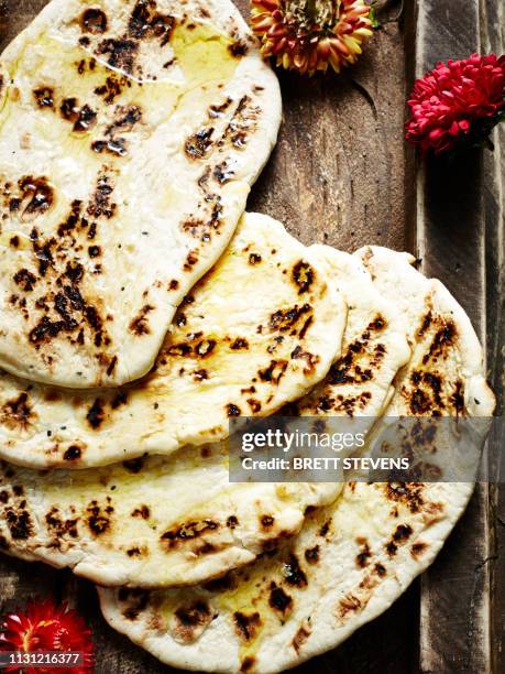 still life with north indian nan bread - naan stock pictures, royalty-free photos & images