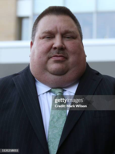 Art Walker of the Coast Guard Investigative Service, attends a news conference about Christopher Paul Hasson after a hearing at the United States...