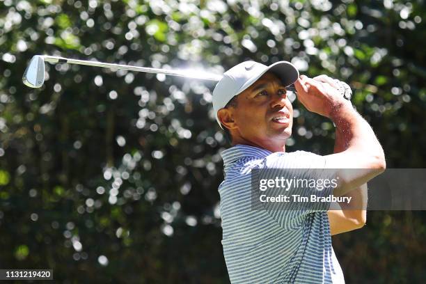 Tiger Woods of the United States plays his shot from the third tee during the first round of World Golf Championships-Mexico Championship at Club de...