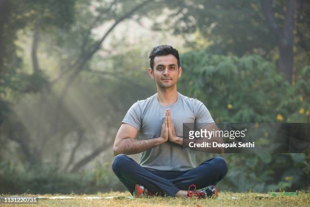 photo of a young man - stock image - zen stock pictures, royalty-free photos & images